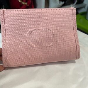 Dior cosmetic bag.